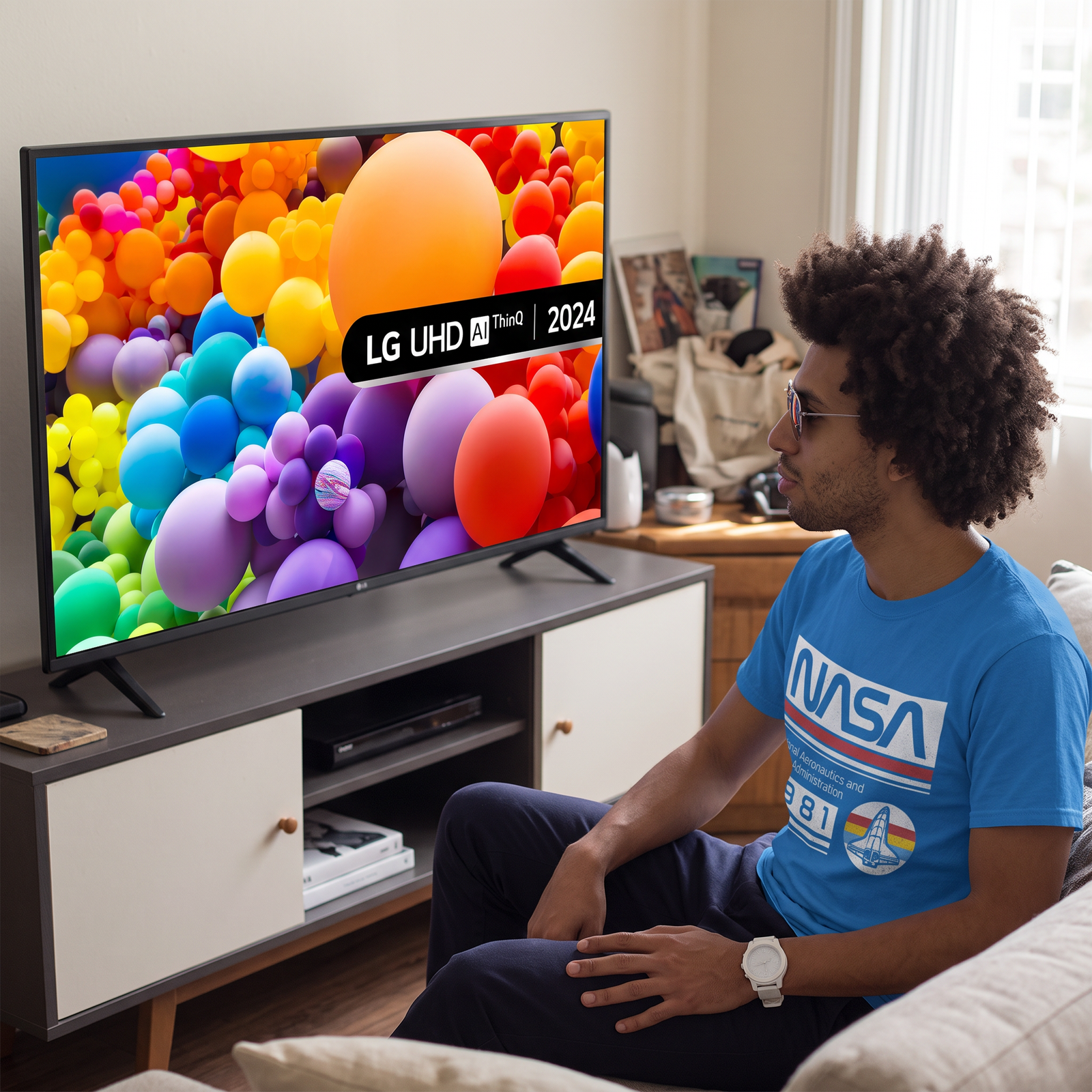 65-Inch 4K Smart TV with HDR displaying colorful abstract graphics in a living room